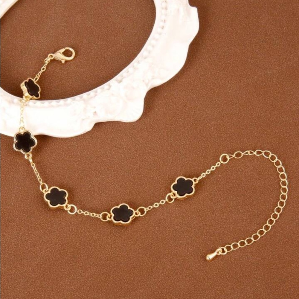 Black flower gold bracelet